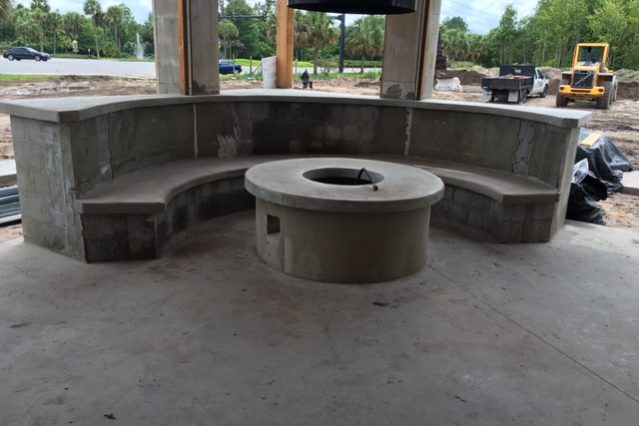 Concrete Contractor Tampa FL ( World of Beer Tampa) Form and pour concrete fire pit and bench for World of Beer Bar.